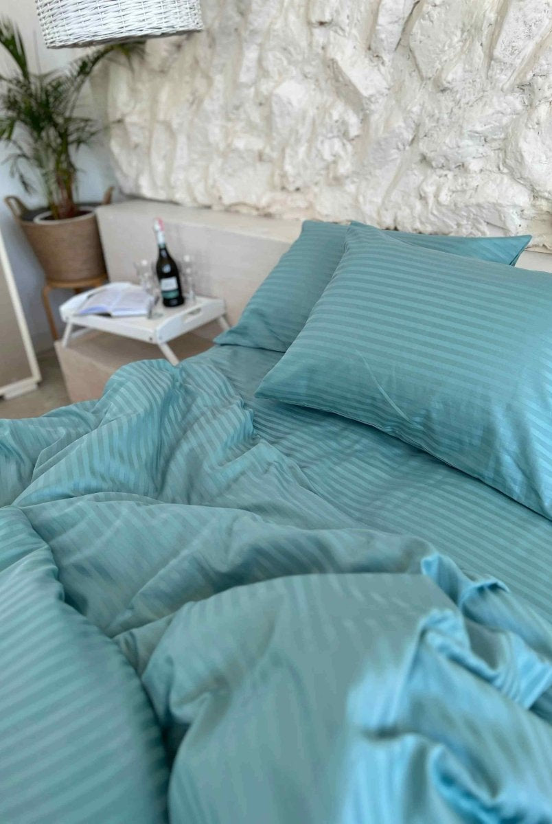Literie en satin à rayures turquoise