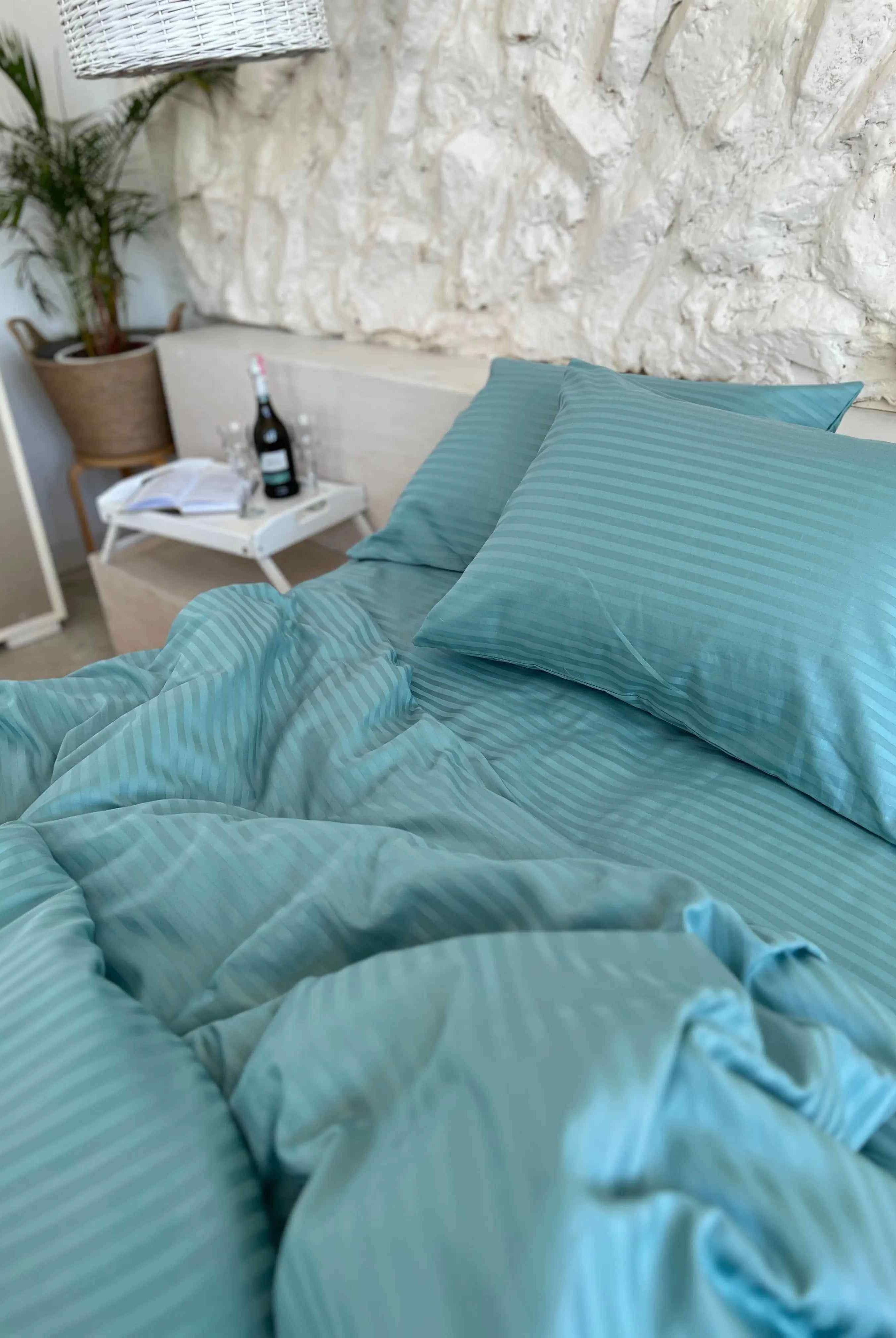 Literie en satin à rayures turquoise
