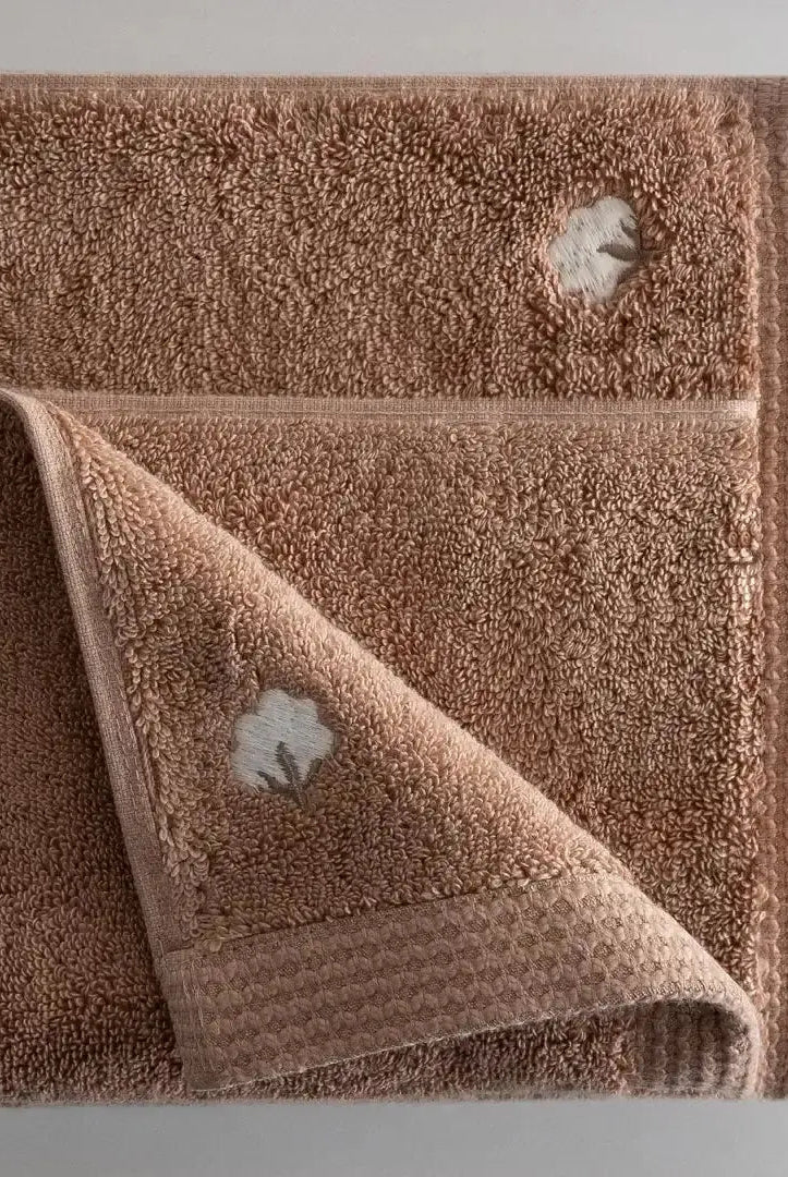 serviette brodée en coton biologique