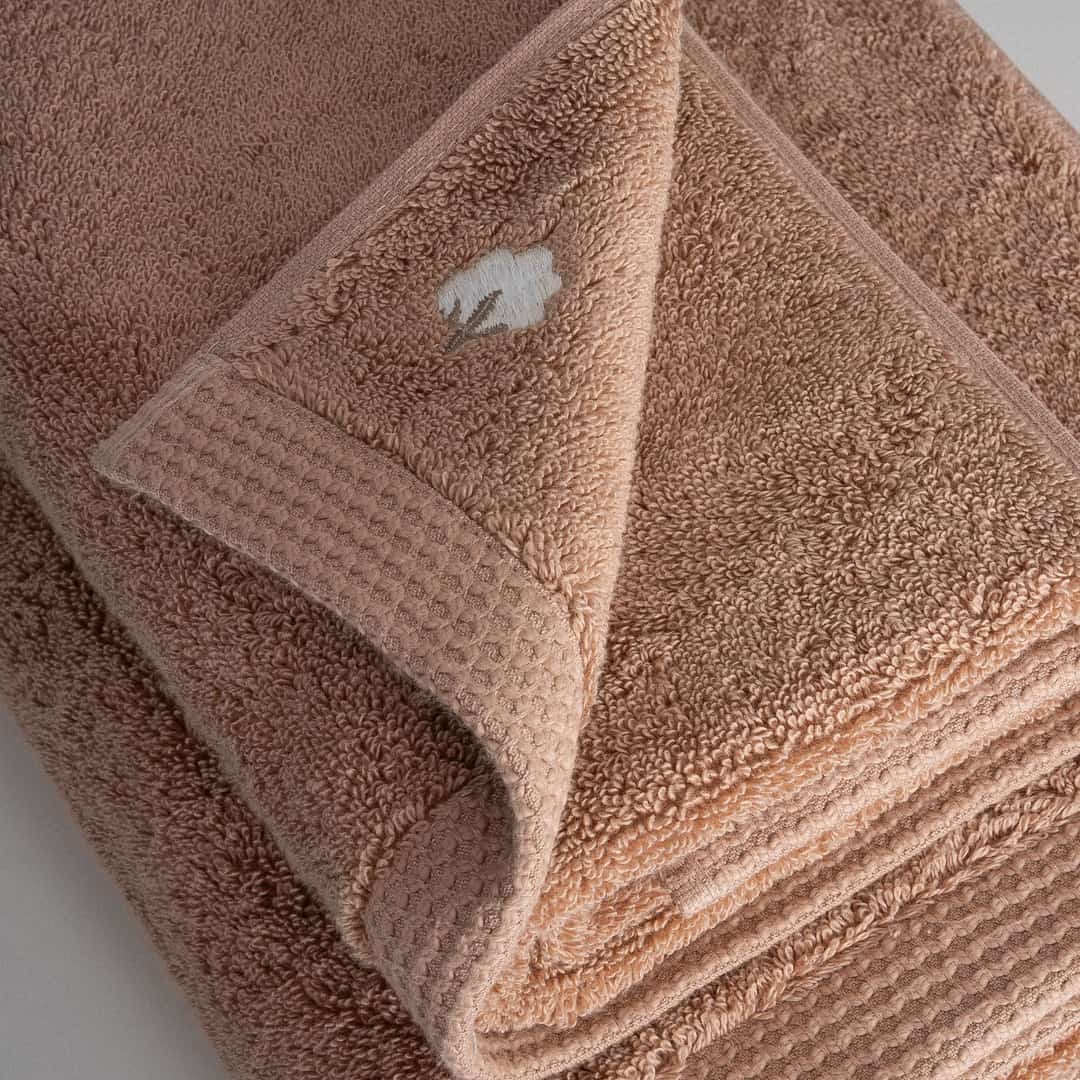 serviette brodée en coton biologique