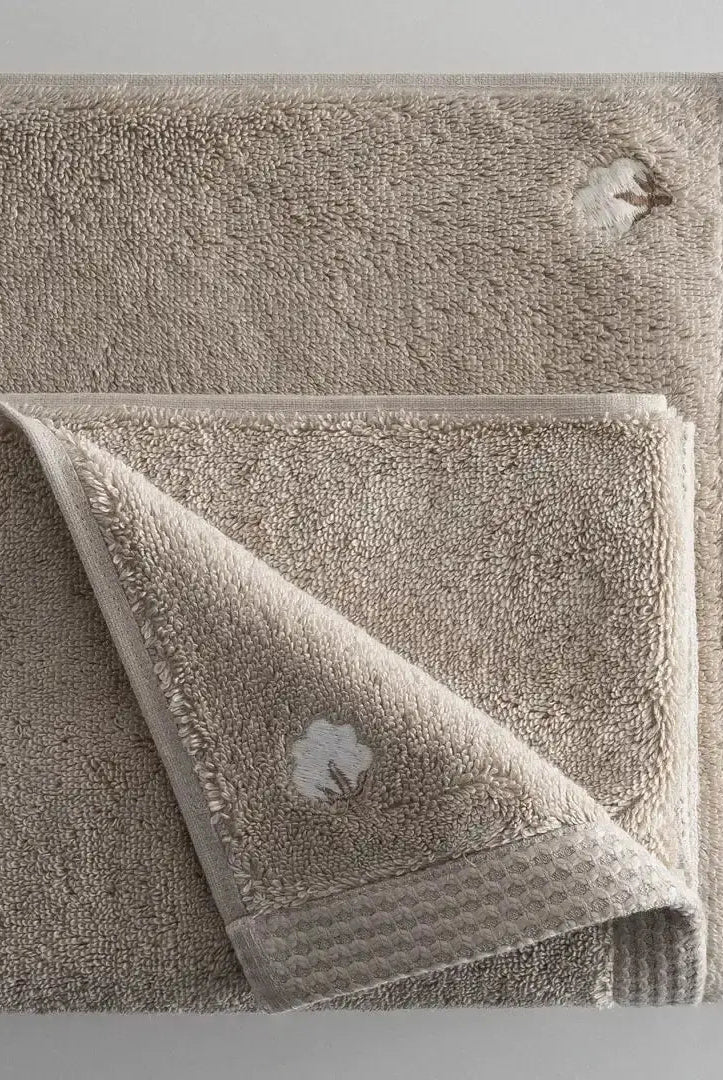 serviette brodée en coton biologique